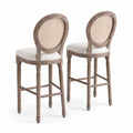Set di 2 sgabelli da bar in legno e rattan con seduta in tessuto bianco crema