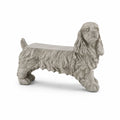Panca a forma di cane in calcestruzzo grigio
